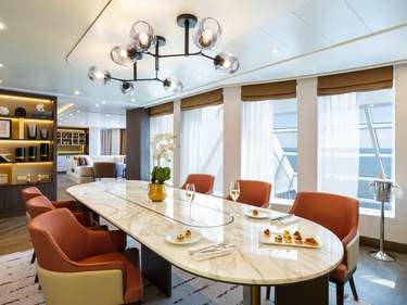 NCL Norwegian Encore The Haven Premier Owner's Suite with Large Balcony Dining Room ©Norwegian Cruise Line.jpeg